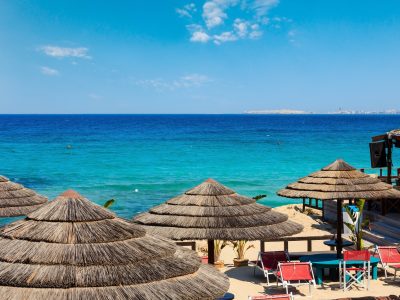 picturesque-ionian-sea-beach-punta-della-suina-salento-puglia-italy-gallipoli-town-view-far (1)